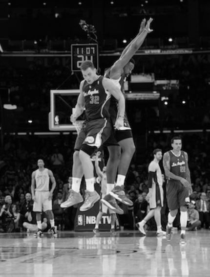 Clipper_teammates_DeAndre_Jordan_Blake_Griffin_do_the_jumping_back_bump_celebration_vs_the_Lakers